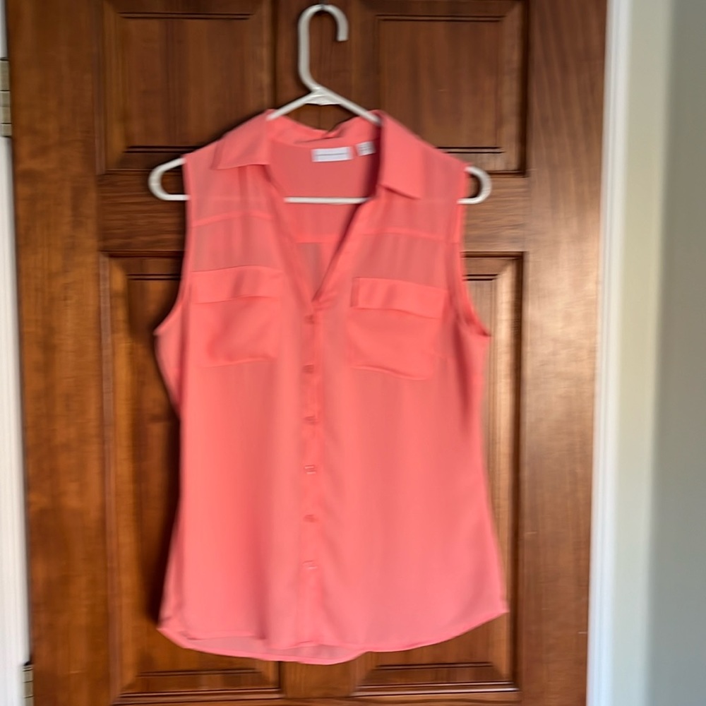 Woman’s sleeveless blouse.